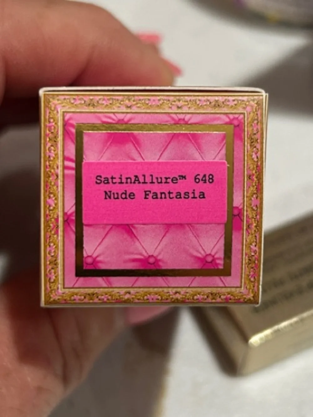 Pat McGrath Nude Lipstick with Gold Bow Accent
